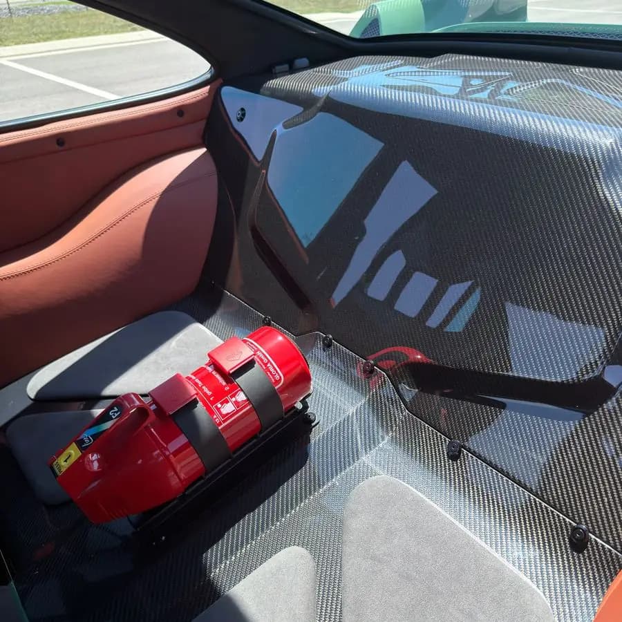 Fire bottle, strapped in