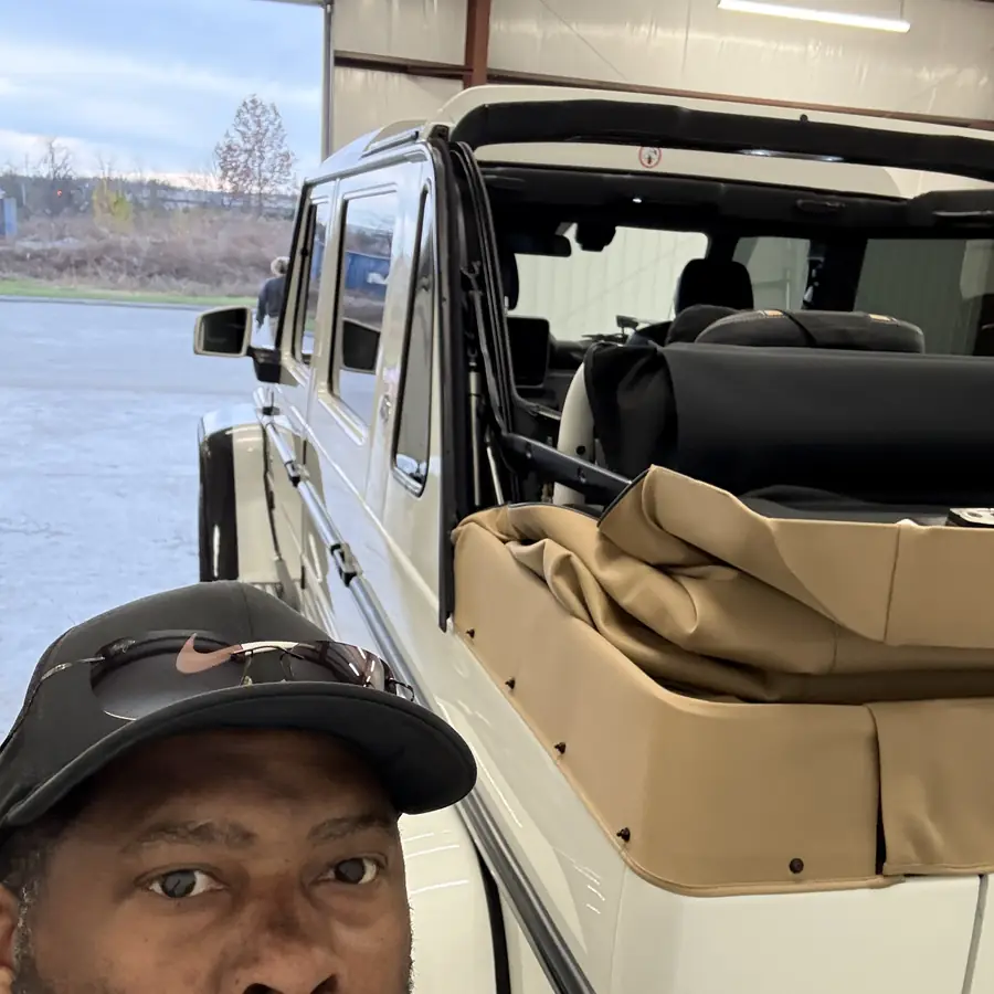 G-Wagen doors open at the barn