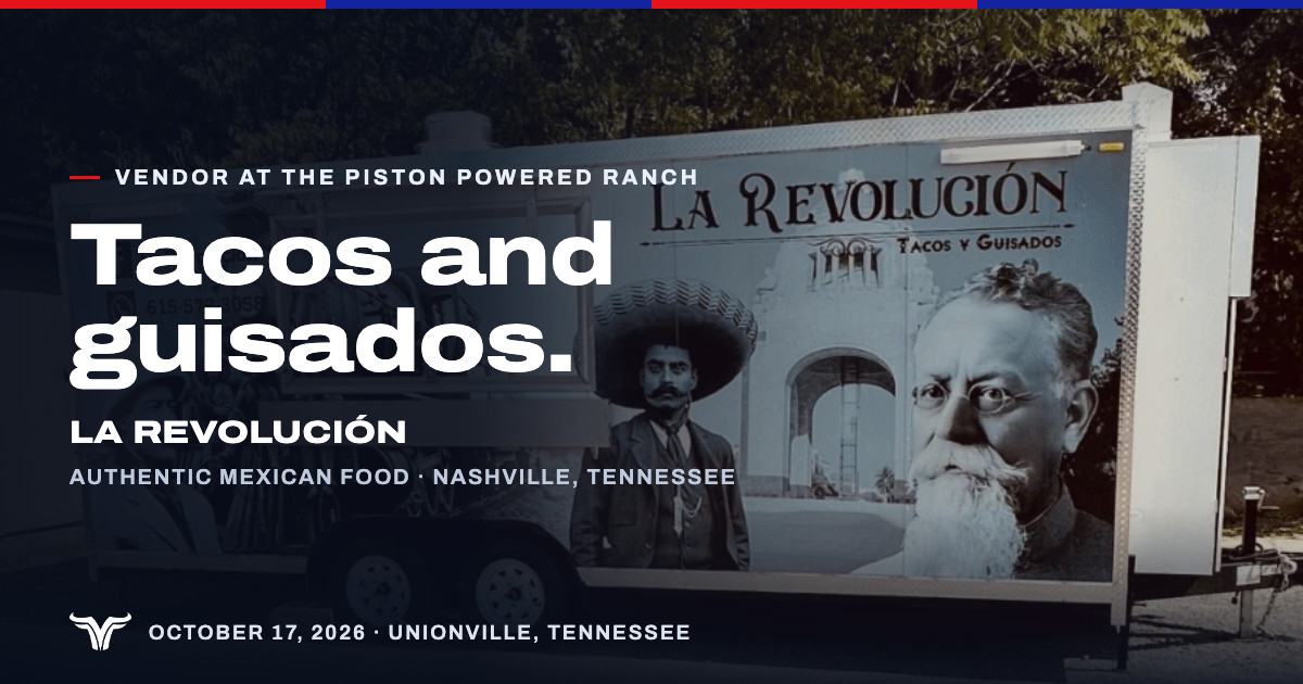 The La Revolución trailer parked under trees, its wrap printed with black and white portraits from the Mexican Revolution. Vendor at The Piston Powered Ranch. Tacos and guisados. La Revolución. Authentic Mexican food · Nashville, Tennessee. October 17, 2026 · Unionville, Tennessee.